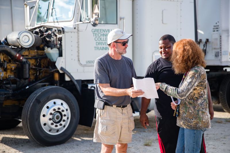 Trucking students and instructors